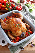 Roast chicken with summer vegetables and herbs