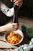 Carbonara with seafood and fresh pepper