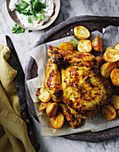 Spicy roast chicken with potatoes and saffron yoghurt aioli