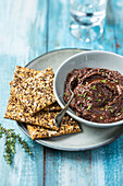 Tapenade of black olives with crispbread