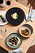 Creamy polenta, beetroot carpaccio and grilled octopus