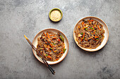 Japchae - Korean glass noodles with vegetables and sesame seeds