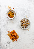 Healthy snacking fun - sweet potato and sesame strips, fruit balls coated in almonds, chickpeas from the airfryer