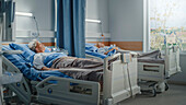 Patients recovering in hospital beds