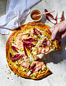 Pizza with radicchio, pistachios and mortadella