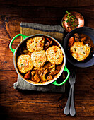 Steak and stout stew with cheddar and thyme dumplings