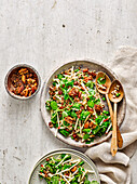 Spelt and apple salad with crunchy nuts and seeds