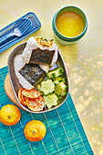 Chicken onigiri with star-shaped cucumber slices