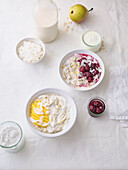 Overnight oats with yoghurt, mango slices and pickled cherries