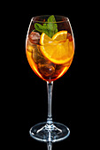 Aperol Spritz with orange slices and mint