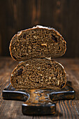 Wholemeal rye bread on a rustic wooden board