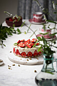 Fraisier cake with strawberries and pistachios