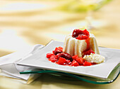 Semolina pudding with strawberries and rhubarb pieces