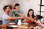 Family enjoying meal together