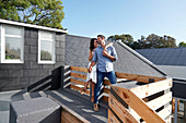 Couple embracing on terrace