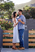 Couple dancing on terrace