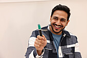 Smiling man in office