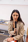 Woman holding microphone