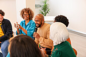 Employee holding microphone in meeting