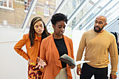 Employees having discussion in office