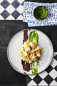 Bacalhau with potato straw and tapenade