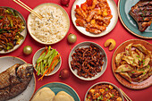 Traditional Chinese New Year dishes with Christmas decorations