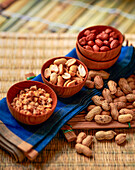 Chopped, roasted and raw peanuts in shells