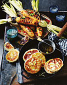 Grilled corn on the cob and braai parmesan bread with garlic-rosemary oil