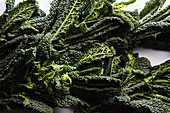 A pile of black cabbage leaves