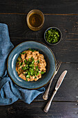 Sliced beef stroganoff with coriander