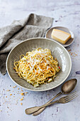 Spaghetti aglio e olio with lemon and rosemary