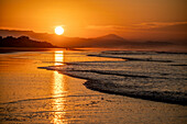 Sunset on the beach in Santa Lucía, Panama.