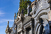 Crosses on elaborate tombs or mausoleums in the Recoleta Cemetery, Buenos Aires, Argentina.