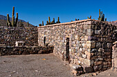 Partially reconstructed ruins in the Pucara of Tilcara, a pre-Hispanic archeological site near Tilcara, Humahuaca Valley, Argentina. This particular building was an Inca ceremonial structure.