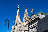 Architectural detail of elaborate spires on a mausoleum in the Recoleta Cemetery in Buenos Aires, Argentina.