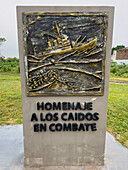 A memorial to the Malvinas War in San Jose de Metan, Argentina. This plaque honors those soldiers fallen in combat. It depicts the sinking of the cruiser ARA General Belgrano. The inscription translate "Homage to the fallen in combat."