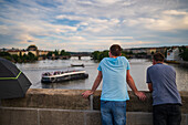 People watching the views from Charles Bridge in Prague