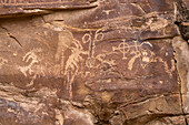 A pre-Hispanic Native American Fremont Culture rock art petroglyph panel by the Rasmussen Cave in Nine Mile Canyon, Utah.