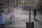 Refreshing water spray fountain to alleviate the high temperatures in summer, Prague