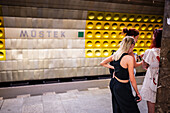 People in Prague Metro platform