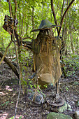 Metal sculpture of Coquena, a mythical creature along a trail in Calilegua National Park in Argentina. It is a character in Argentine folklore and a protector of animals of the mountains.