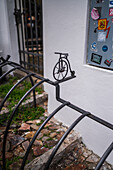 Bicycle parking racks with little bike sculptures, Prague