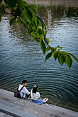 Couple in Hiroshima Peace Memorial and Motoyasu River in Hiroshima, Japan