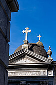 Crosses on elaborate tombs or mausoleums in the Recoleta Cemetery, Buenos Aires, Argentina.