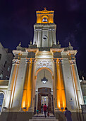 The exterior of the Cathedral of San Salvador de Jujuy, Argentina, lighted at night.