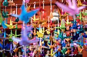 Origami paper crane birds hanging, in Toshogu Shrine, Hiroshima, Japan