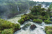 Iguazu Falls National Park in Brazil in the foreground and Argentina across the Iguazu River. A UNESCO World Heritage Site.