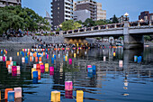 Motoyasu bridge in front of Atomic Bomb Dome with floating lamps on Motoyasu-gawa River during Peace Memorial Ceremony every August 6 in Hiroshima, Japan