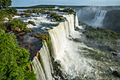 Iguazu Falls National Park in Brazil in the foreground and Argentina behind. A UNESCO World Heritage Site. Pictured is the Floriano Waterfall in front and Two Musketeers Watrefall across the river in Argentina