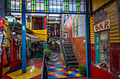 Colorfully-painted shopping arcade in a building in Caminito in La Boca, Buenos Aires, Argentina.